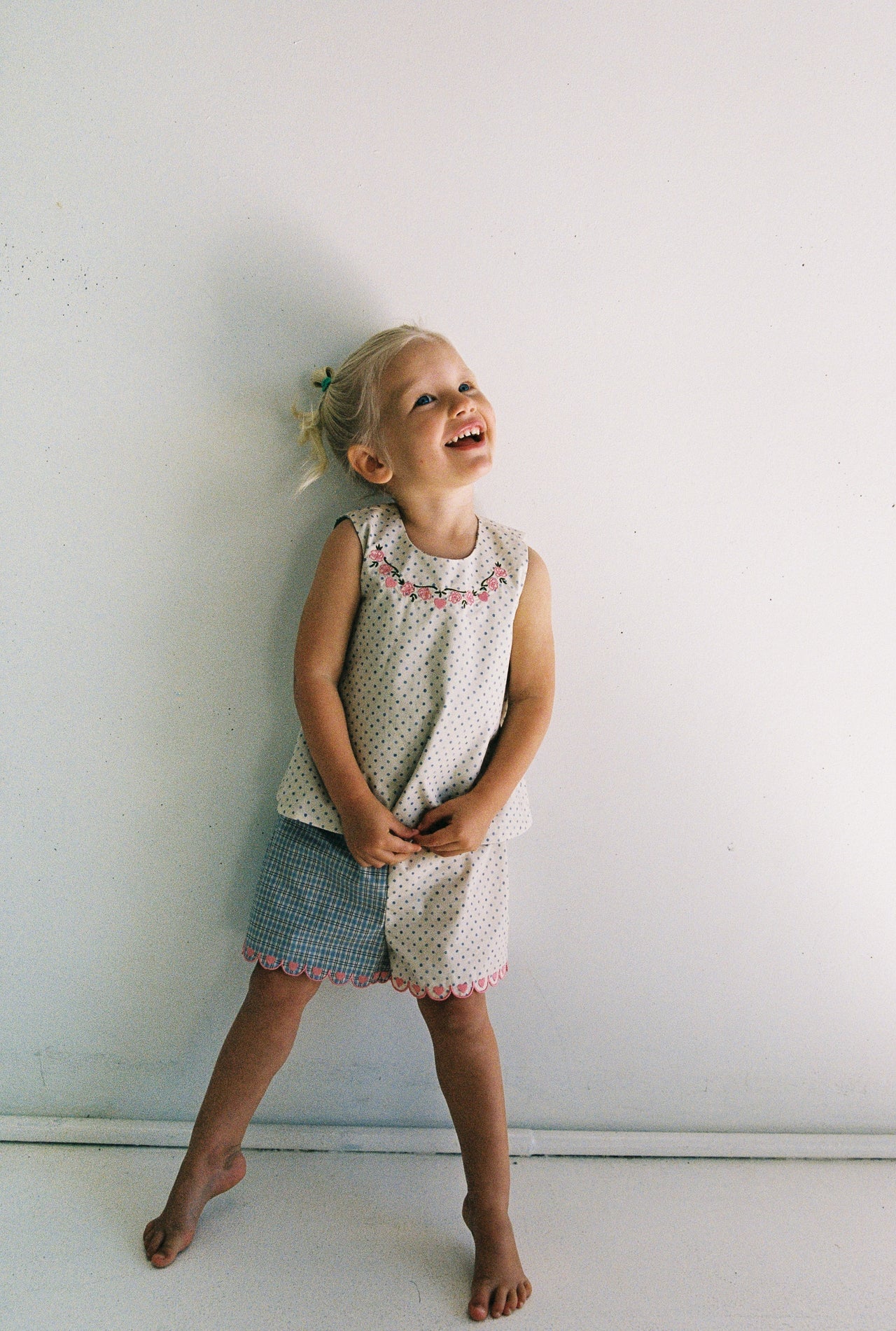 Della Short | blue check