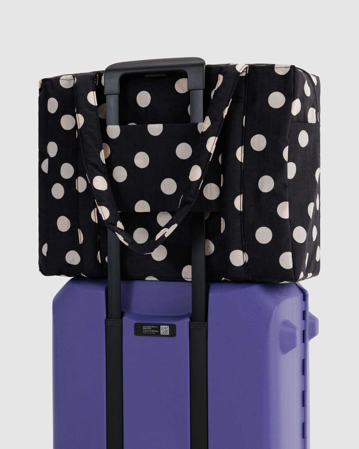 Small cloud carry on | black and cream polka dot