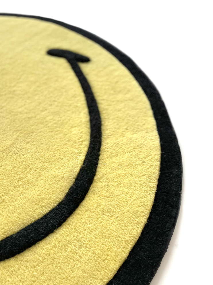 smiley floor rug - yellow
