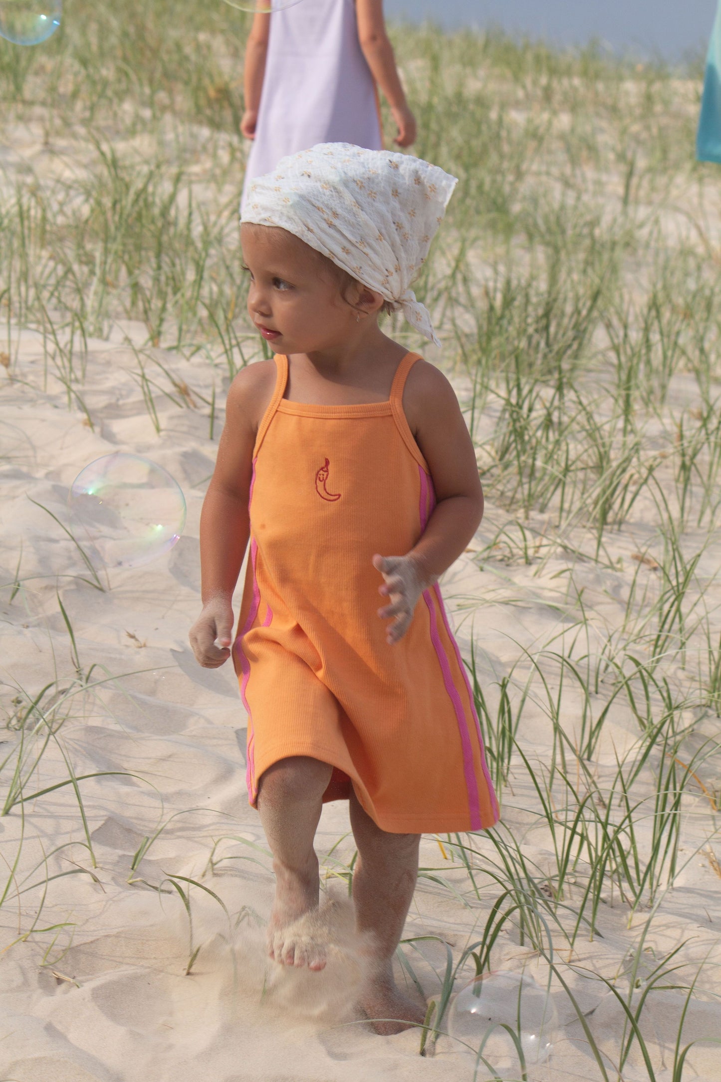sofia sundress in tangerine by pico