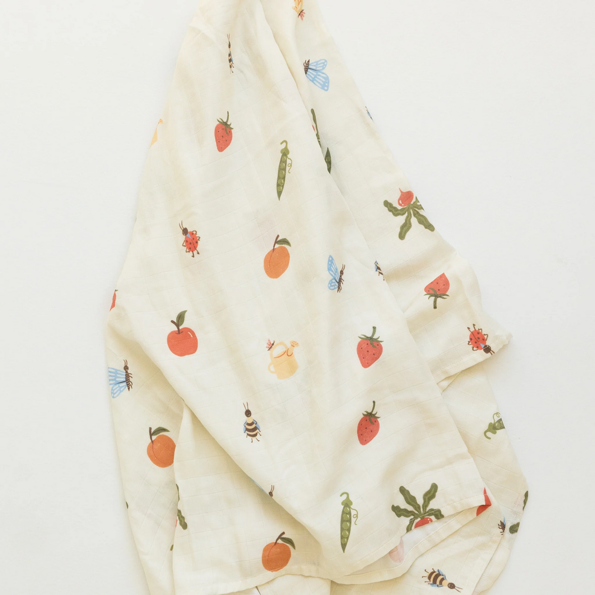 Garden jumble organic swaddle