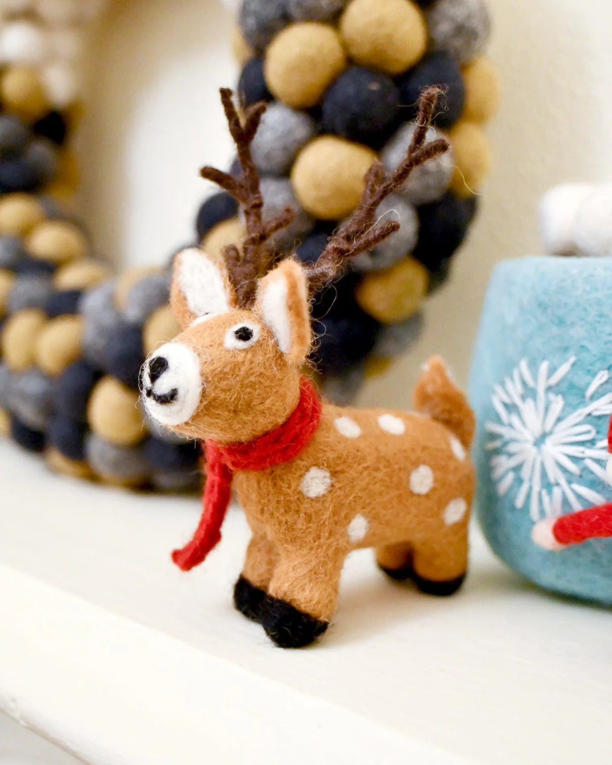 Felt reindeer with red scarf toy