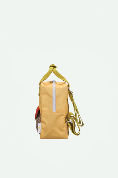 backpack small | envelope | apple juice