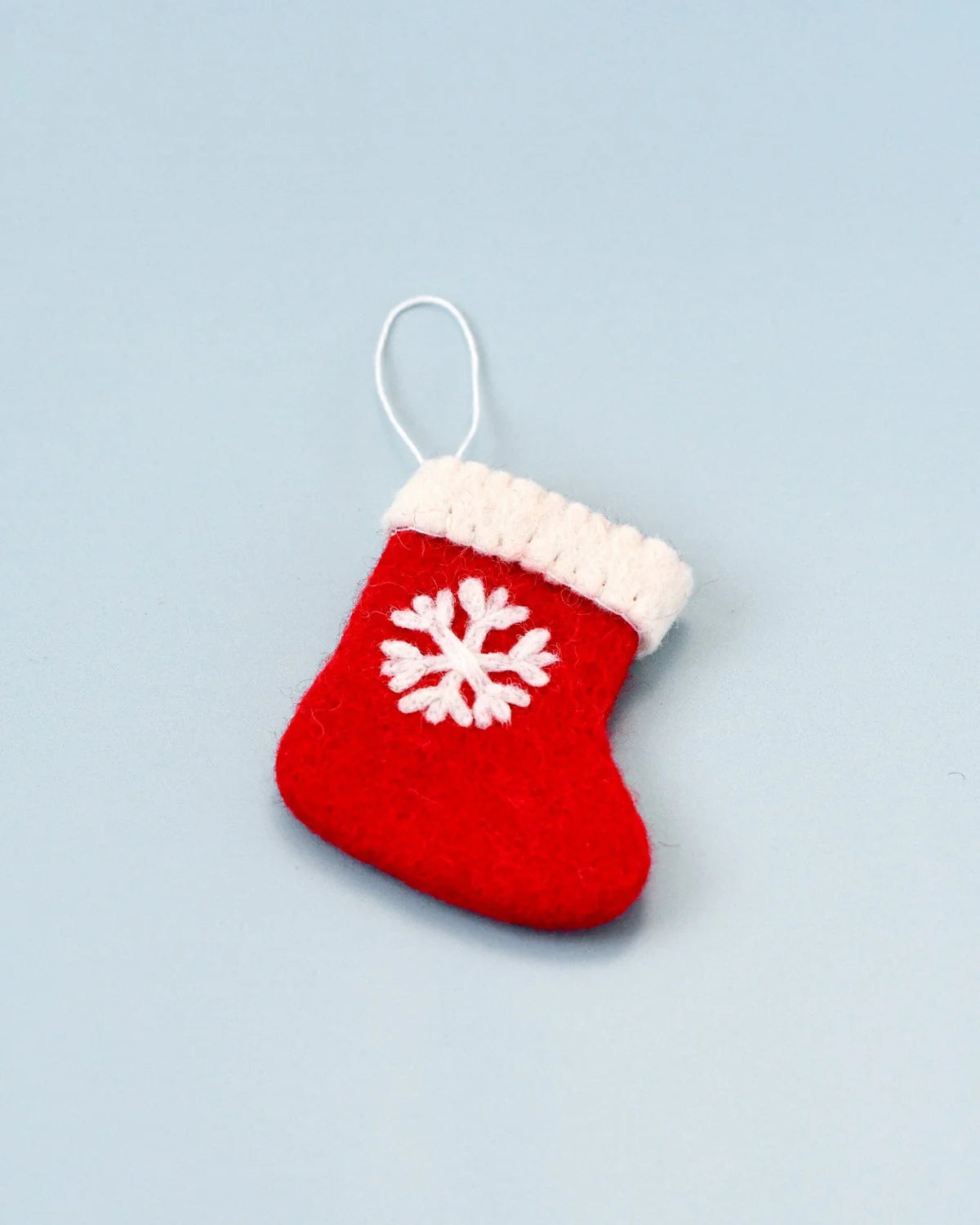 Felt christmas stocking with snowflake ornament