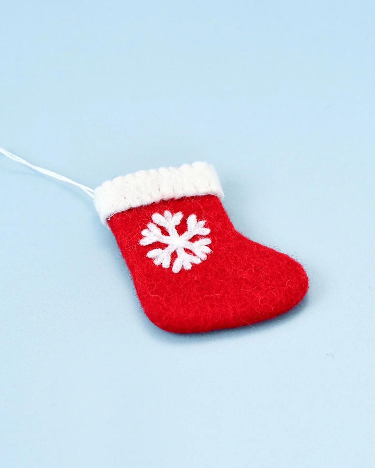 Felt christmas stocking with snowflake ornament
