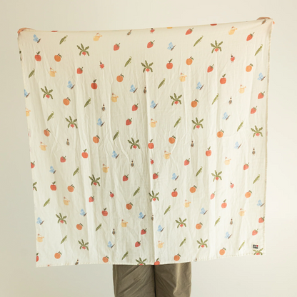 Garden jumble organic swaddle