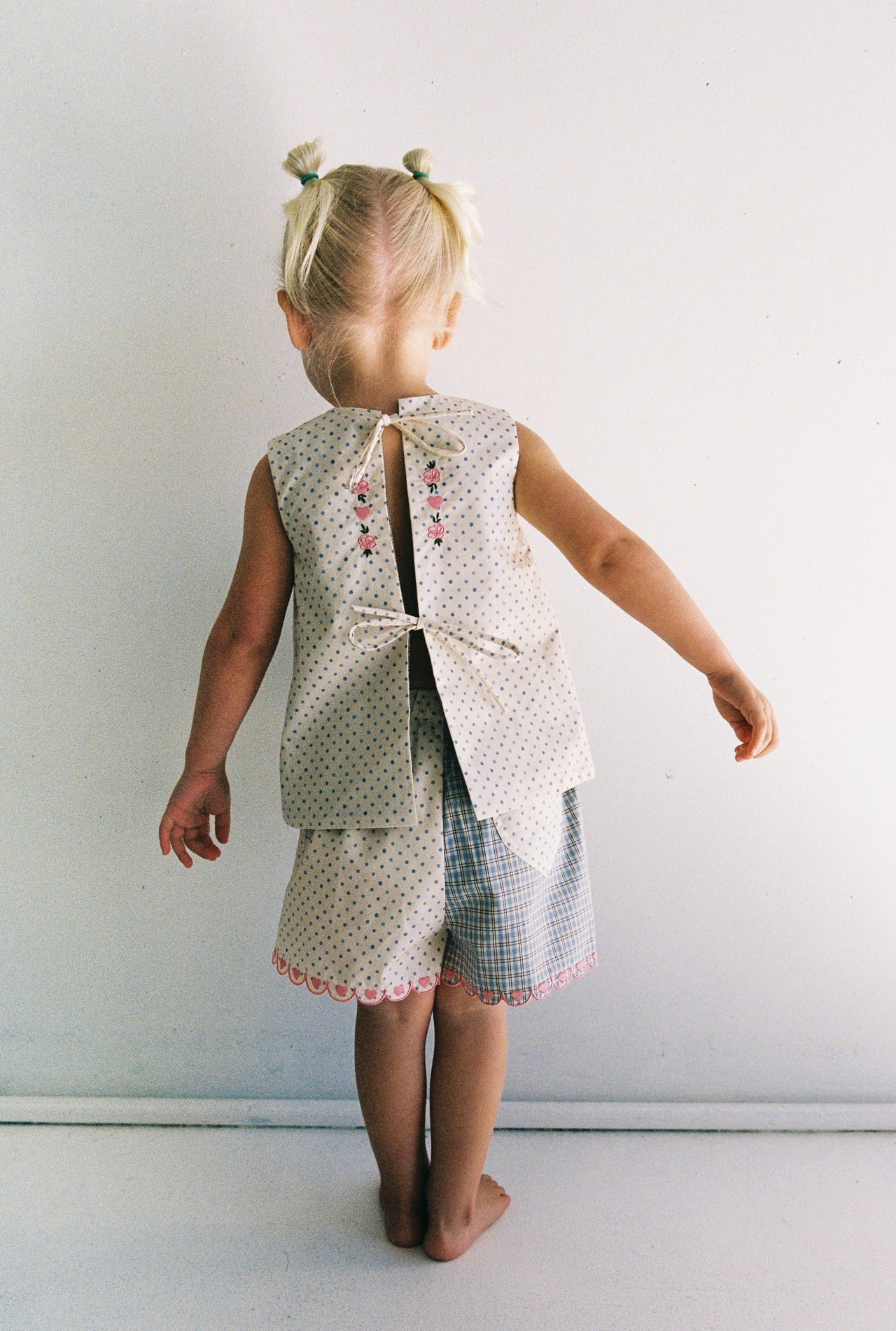 Della Short | blue check