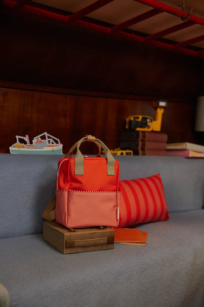 backpack small | colour blocking | lifebuoy orange + coral pink