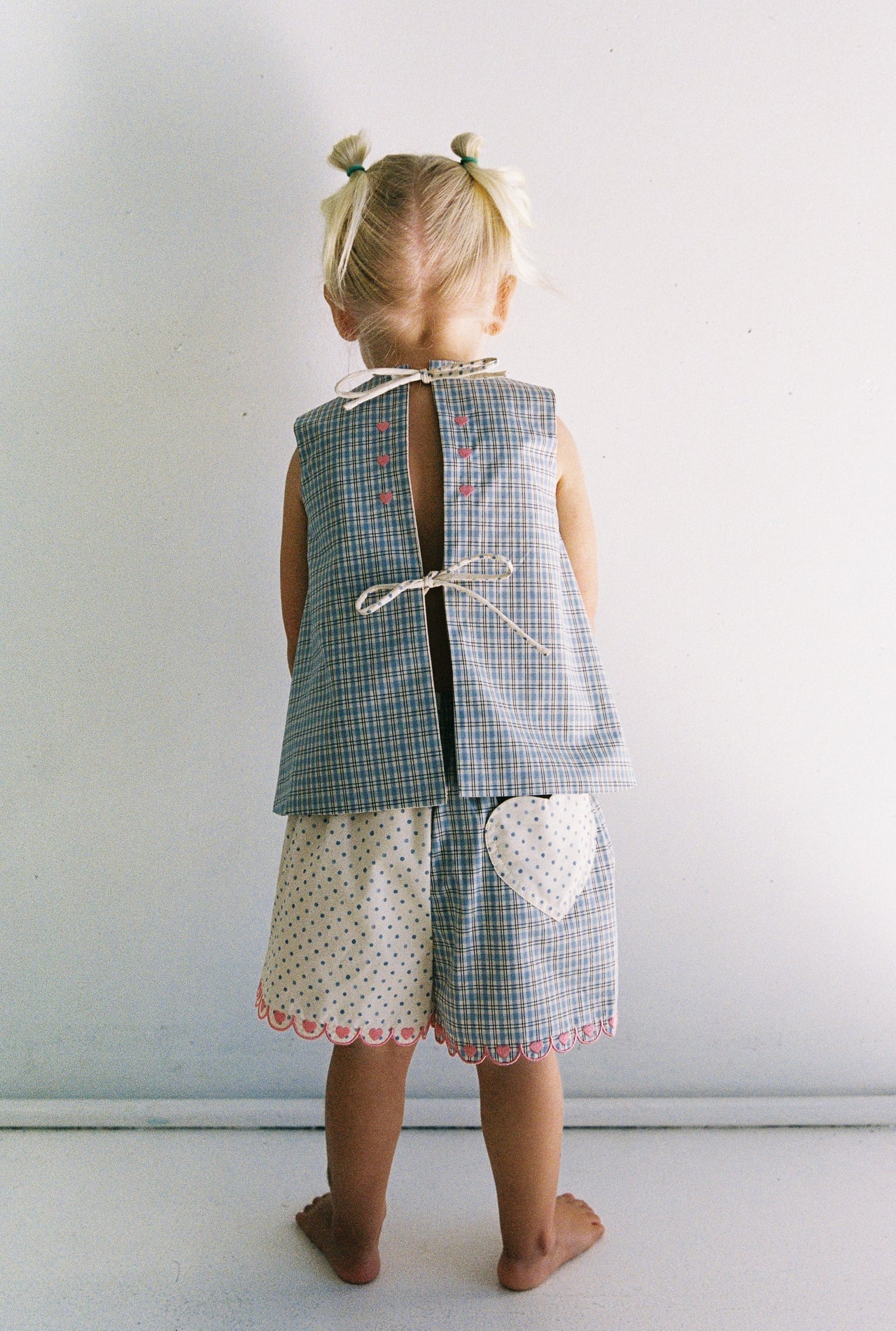 Della Short | blue check