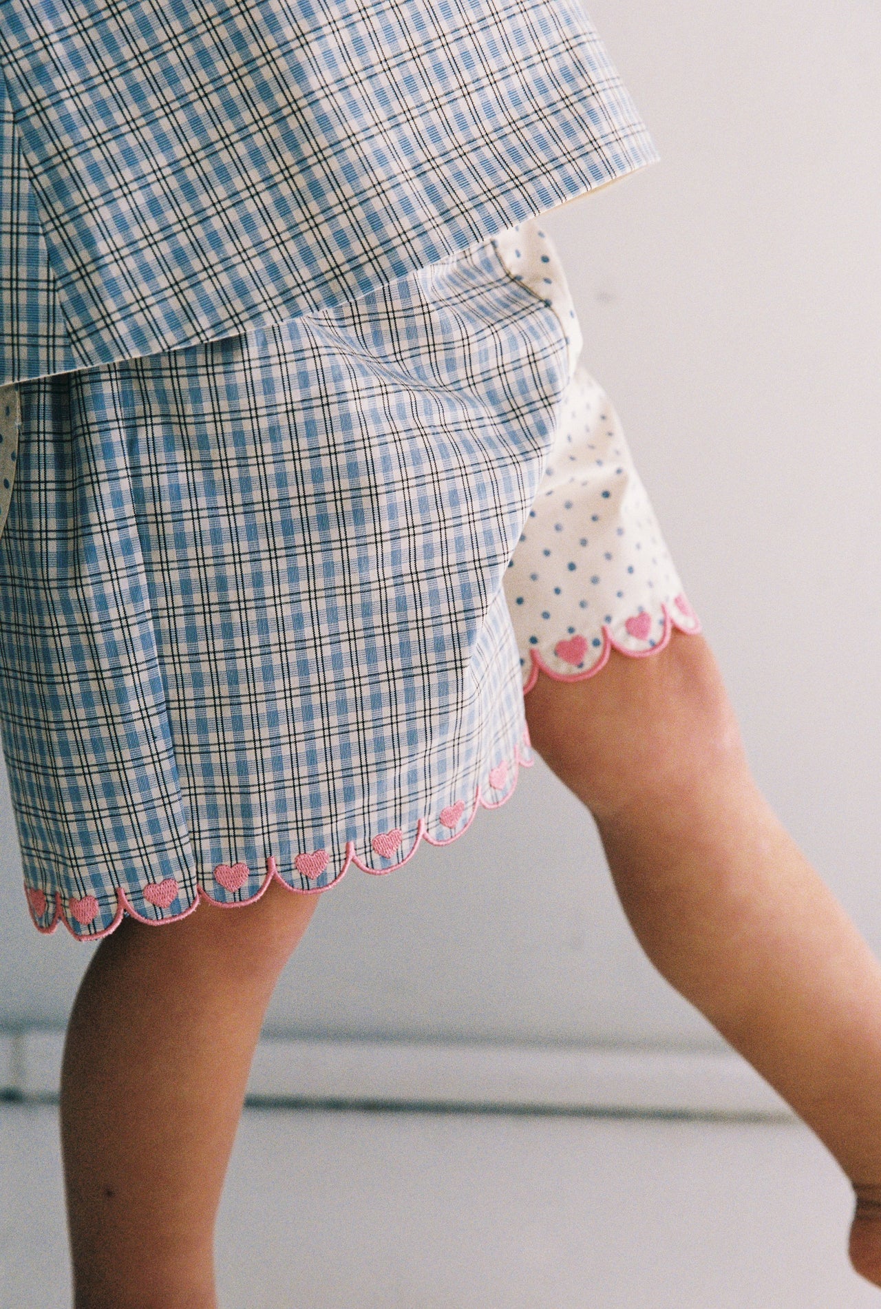 Della Short | blue check
