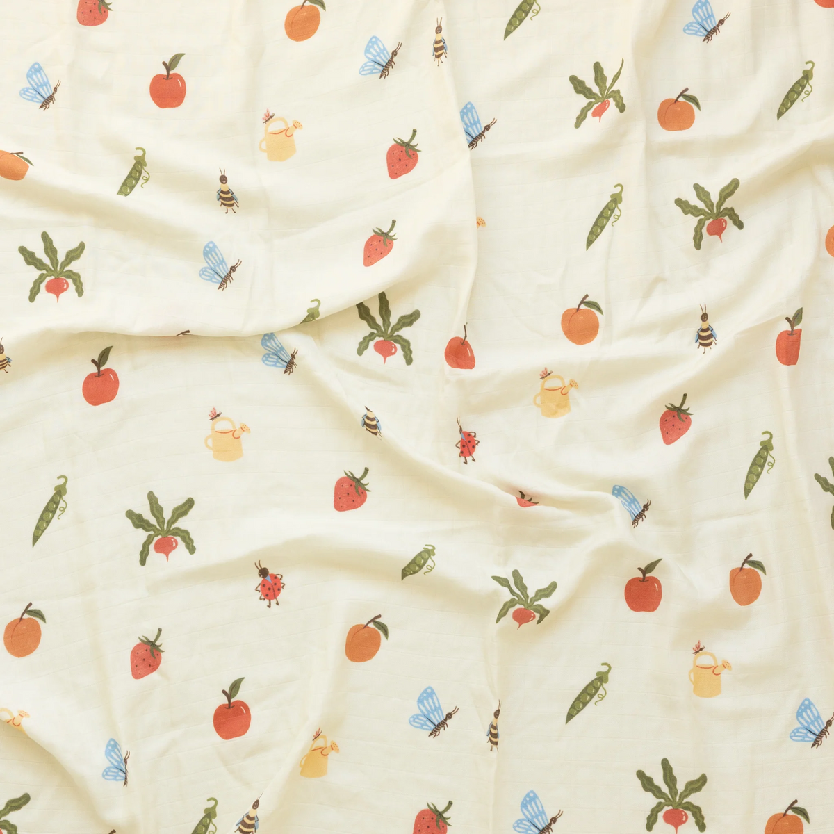 Garden jumble organic swaddle