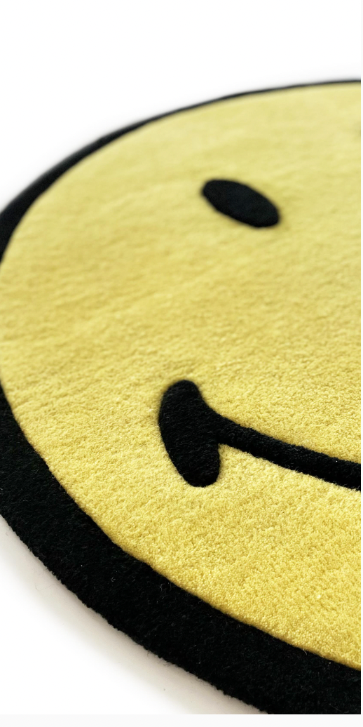 smiley floor rug - yellow
