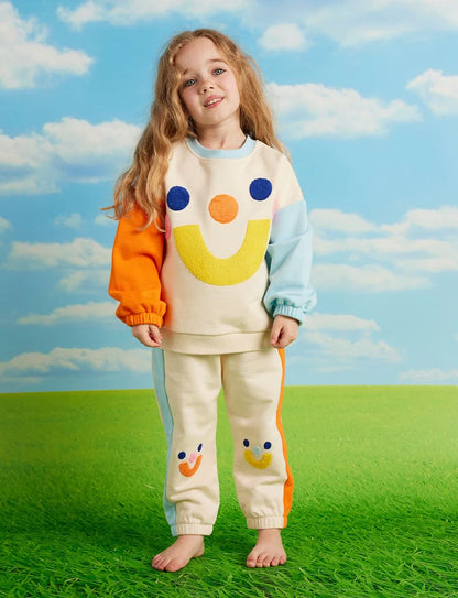 Cream smiley track pants